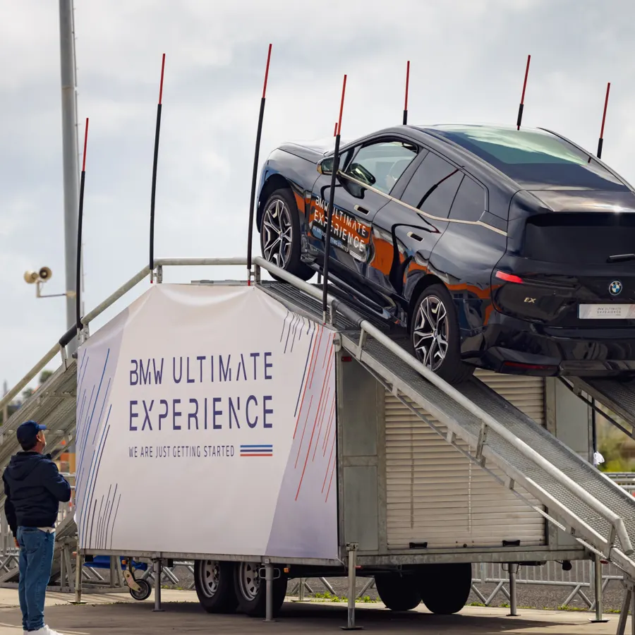 BMW iX on a demonstration ramp at the BMW Ultimate Experience